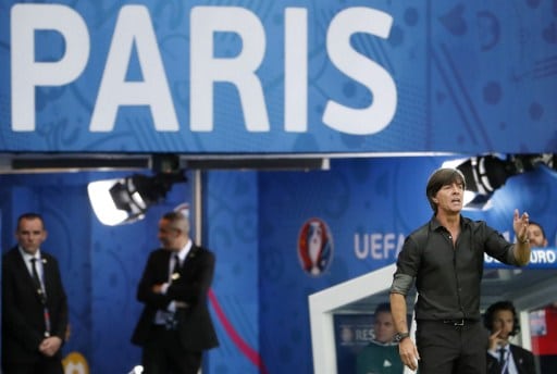 Germany's coach Joachim Loew (R) gestures during the Euro 2016 group C football match between Northern Ireland and Germany at the Parc des Princes stadium in Paris on June 21, 2016. / AFP PHOTO / ODD ANDERSEN
