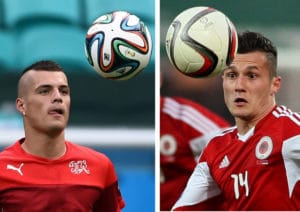 Das Schweiz-albanischer Brüderpaar: Granit Xhaka spielt für die Schweiz,  Taulant Xhaka (R) für Albanien. / AFP PHOTO / Anne-Christine POUJOULAT AND GENT SHKULLAKU