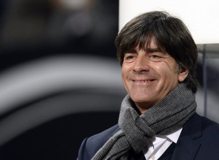 German national team's head coach Joachim Loew smiles prior to the UEFA 2016 European Championship qualifying round Group D football match Germany vs Gibraltar in Nuremberg, southern Germany on November 14, 2014.  AFP PHOTO / CHRISTOF STACHE