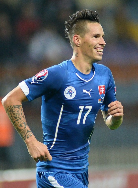 Marek Hamsik im blauen Slowakei-Trikot am 12.Oktober 2014. AFP PHOTO/MAKSIM MALINOVSKY