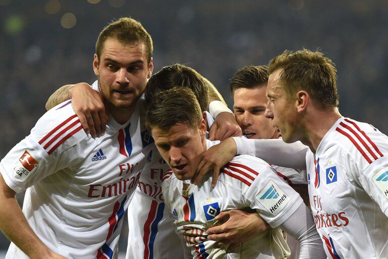 Spieler des Hamburger SV bejubeln einen Treffer. (© AFP)