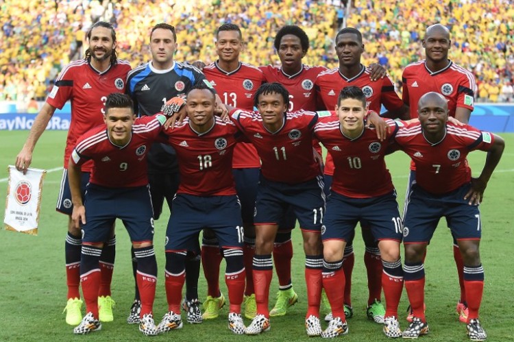 (fromL, Background) Colombia's defender and captain Mario Alberto Yepes, Colombia's goalkeeper David Ospina, Colombia's midfielder Fredy Guarin, Colombia's midfielder Carlos Sanchez, Colombia's defender Cristian Zapata and Colombia's forward Victor Ibarbo (fromL, foreground) Colombia's forward Teofilo Gutierrez, Colombia's defender Juan Camilo Zuniga, Colombia's midfielder Juan Guillermo Cuadrado, Colombia's midfielder James Rodriguez and Colombia's defender Pablo Armero pose prior to the quarter-final football match between Brazil and Colombia at the Castelao Stadium in Fortaleza during the 2014 FIFA World Cup on July 4, 2014. AFP PHOTO / EITAN ABRAMOVICH