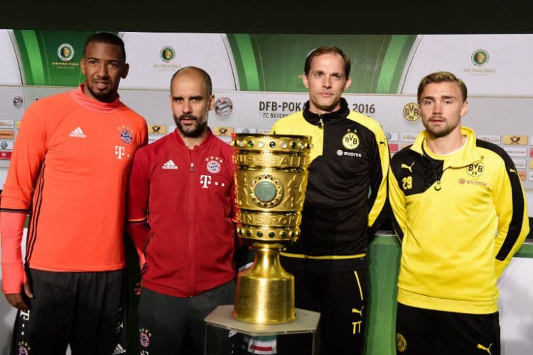 Immer ein Genuss: Die Duelle des FCB und BVB auch in den Pokalwettbewerben. Hier: (v.l.n.r.) Jérôme Boateng, Pep Guardiola, Thomas Tuchel und Marcel Schmelzer vor dem Pokalfinale in Berlin 2016. / AFP PHOTO / TOBIAS SCHWARZ