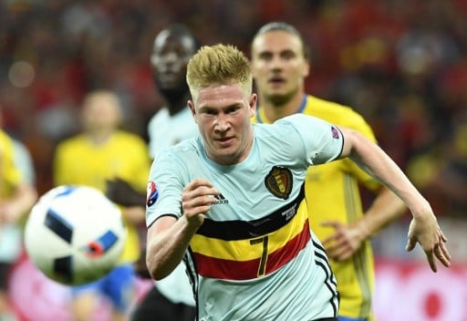 Belgium's midfielder Kevin De Bruyne runs for the ball during the Euro 2016 group E football match between Sweden and Belgium at the Allianz Riviera stadium in Nice on June 22, 2016. / AFP PHOTO / JONATHAN NACKSTRAND