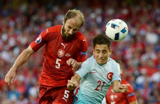 Czech Republic's defender Roman Hubnik (L) vies with Turkey's forward Emre Mor during the Euro 2016 group D football match between Czech Republic and Turkey at Bollaert-Delelis stadium in Lens on June 21, 2016. / AFP PHOTO / DENIS CHARLET