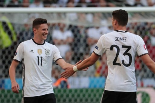 Julian Draxler macht das 3:0 nach Vorlage von Mario Gomez gegen die Slowakei am 26.Juni 2016. / AFP PHOTO / KENZO TRIBOUILLARD