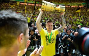 Fußball heute Abend: Wer gewinnt den DFB-Pokal? Nach 2017 könnte der BVB wieder den Pott holen! Photo: AFP.