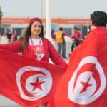 Tunesische Fußballfans in Katar beim FIFA Arabic Cup - hier beim Halbfinale gegen Ägypten.