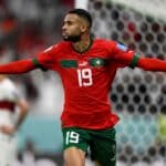 Marokkos Stürmer (Nr. 19) Youssef En-Nesyri jubelt nach seinem Führungstor während des Viertelfinales der Fußballweltmeisterschaft Katar 2022 zwischen Marokko und Portugal im Al-Thumama-Stadion in Doha am 10. Dezember 2022. (Foto: PATRICIA DE MELO MOREIRA / AFP)