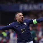 France's forward #10 Kylian Mbappe celebrates after scoring a goal during the UEFA EURO 2024 Group B qualifying football match between France and Gibraltar at the Allianz Riviera stadium in Nice, southeastern France, on November 18, 2023. (Photo by FRANCK FIFE / AFP)