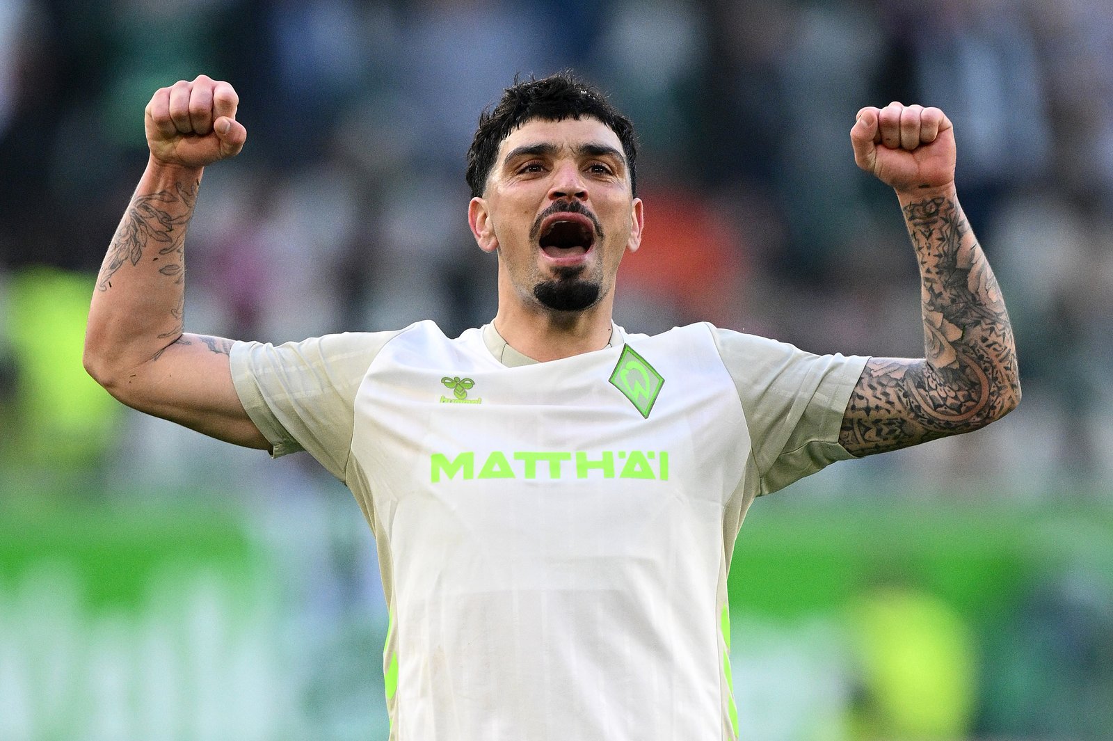 Cameron Puertas von SV Werder Bremen bejubelt den Sieg nach dem Bundesliga-Spiel beim VfL Wolfsburg in der Volkswagen Arena am 21. März 2026. Stuart Franklin / Getty Images